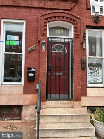 a front view of a house with a door