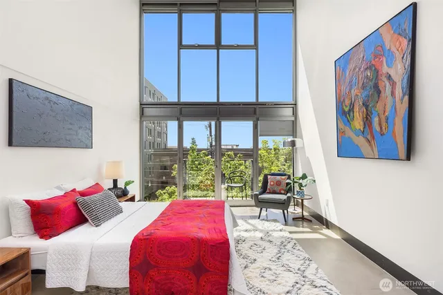 a room with furniture and a potted plant