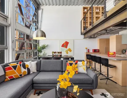 a stairs and a couch in a living room