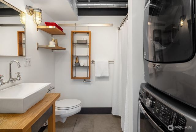 a view of a chairs and table in a patio