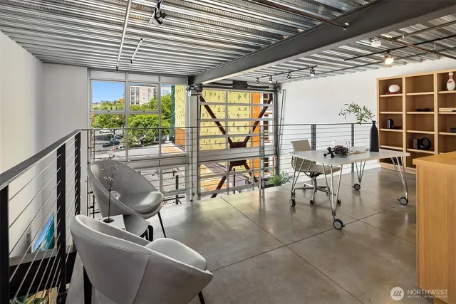 a view of a patio with a table and chairs