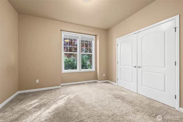 a view of a garage with parked cars