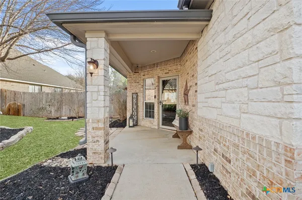 a view of a back yard of the house