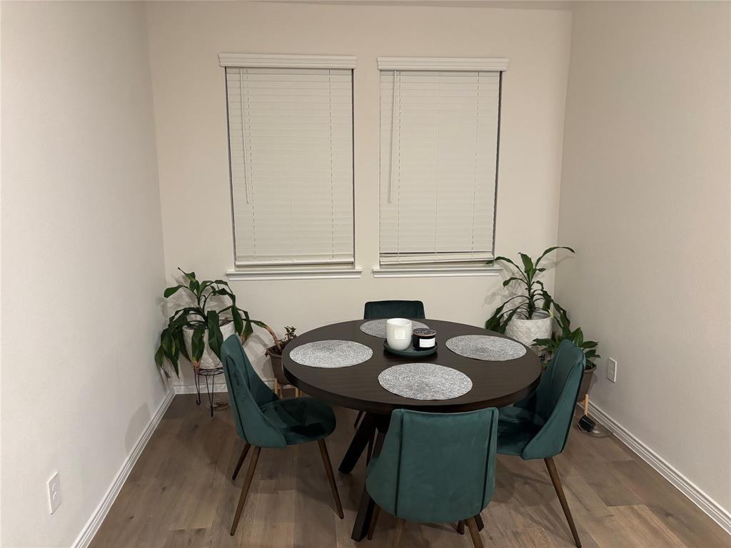 10512 Autumn Leaves Lane Aubrey, TX 76227 - Photo 5 of 9 a dining room with furniture and wooden floor