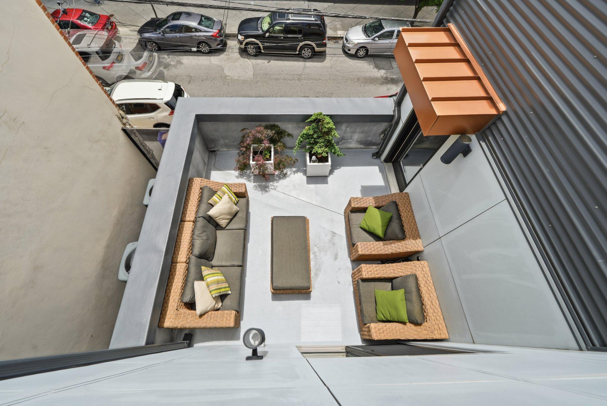 237 West Thompson Street Philadelphia, PA 19122 - Photo 17 of 35 Top floor deck looking to lower entertaining deck.