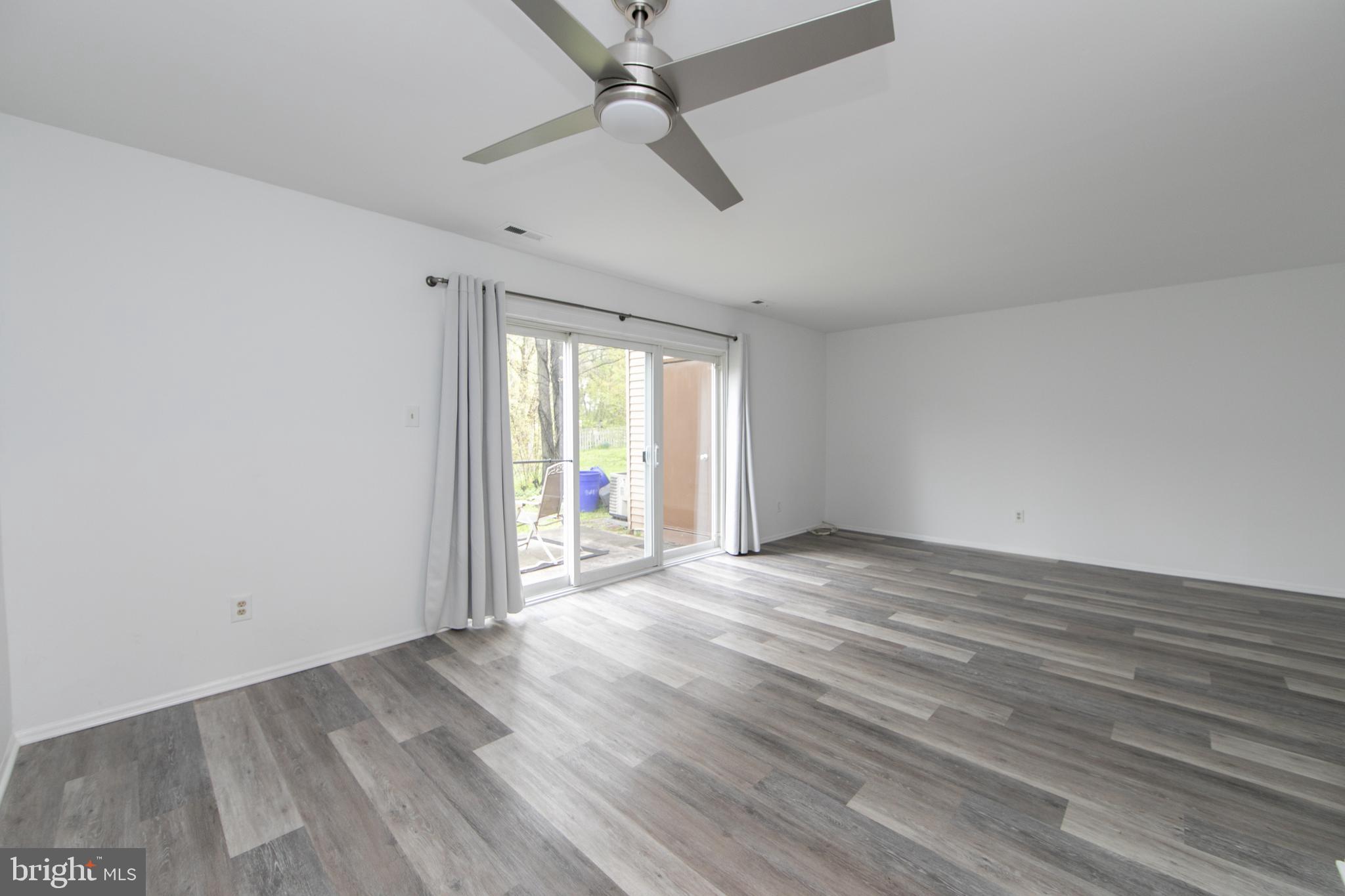 5401 Red Haven Drive Evesham, NJ 08053 - Photo 14 of 35 wooden floor in an empty room with a window
