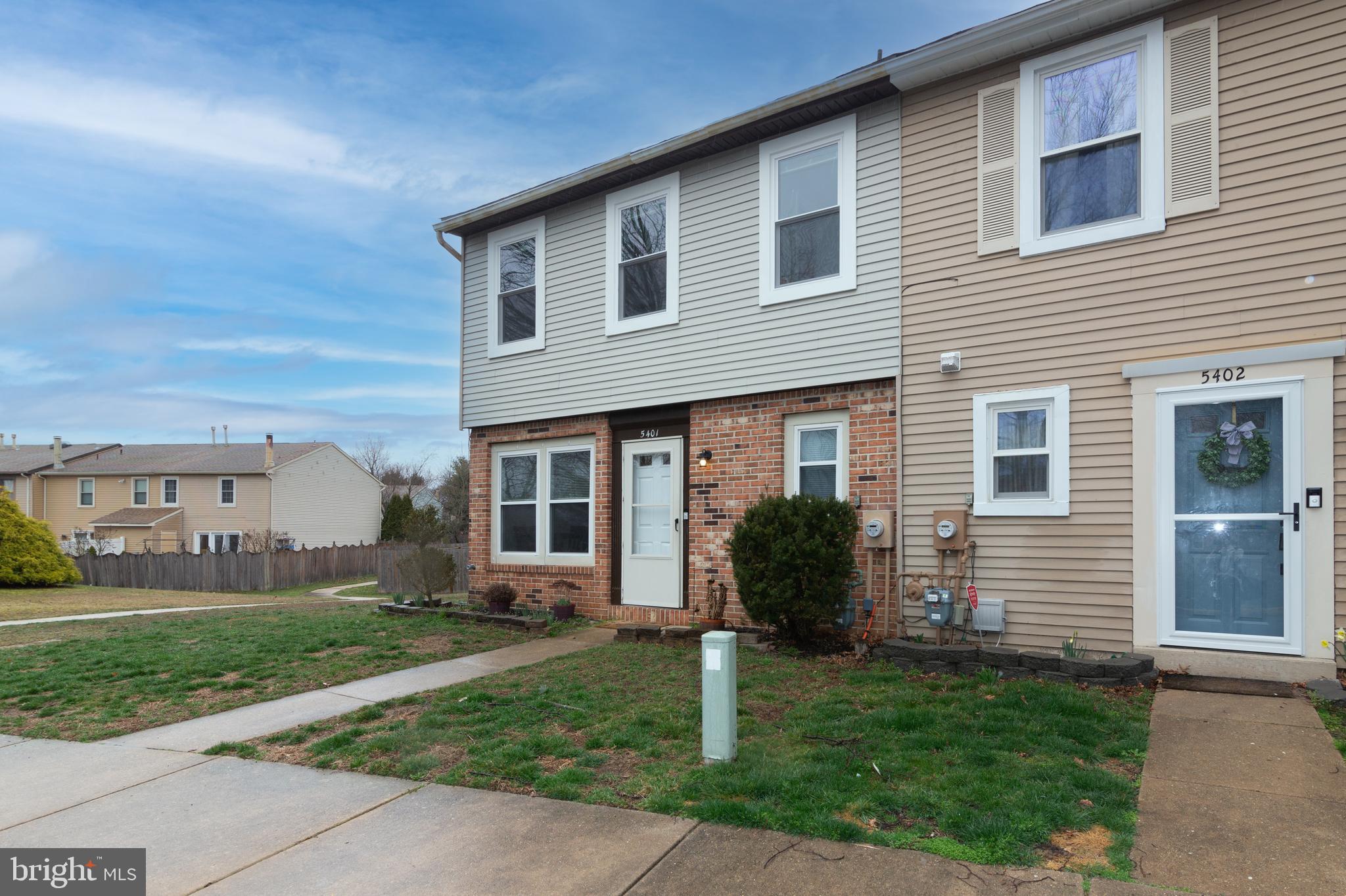 5401 Red Haven Drive Evesham, NJ 08053 - Photo 2 of 35 a front view of a house with a yard and potted plants