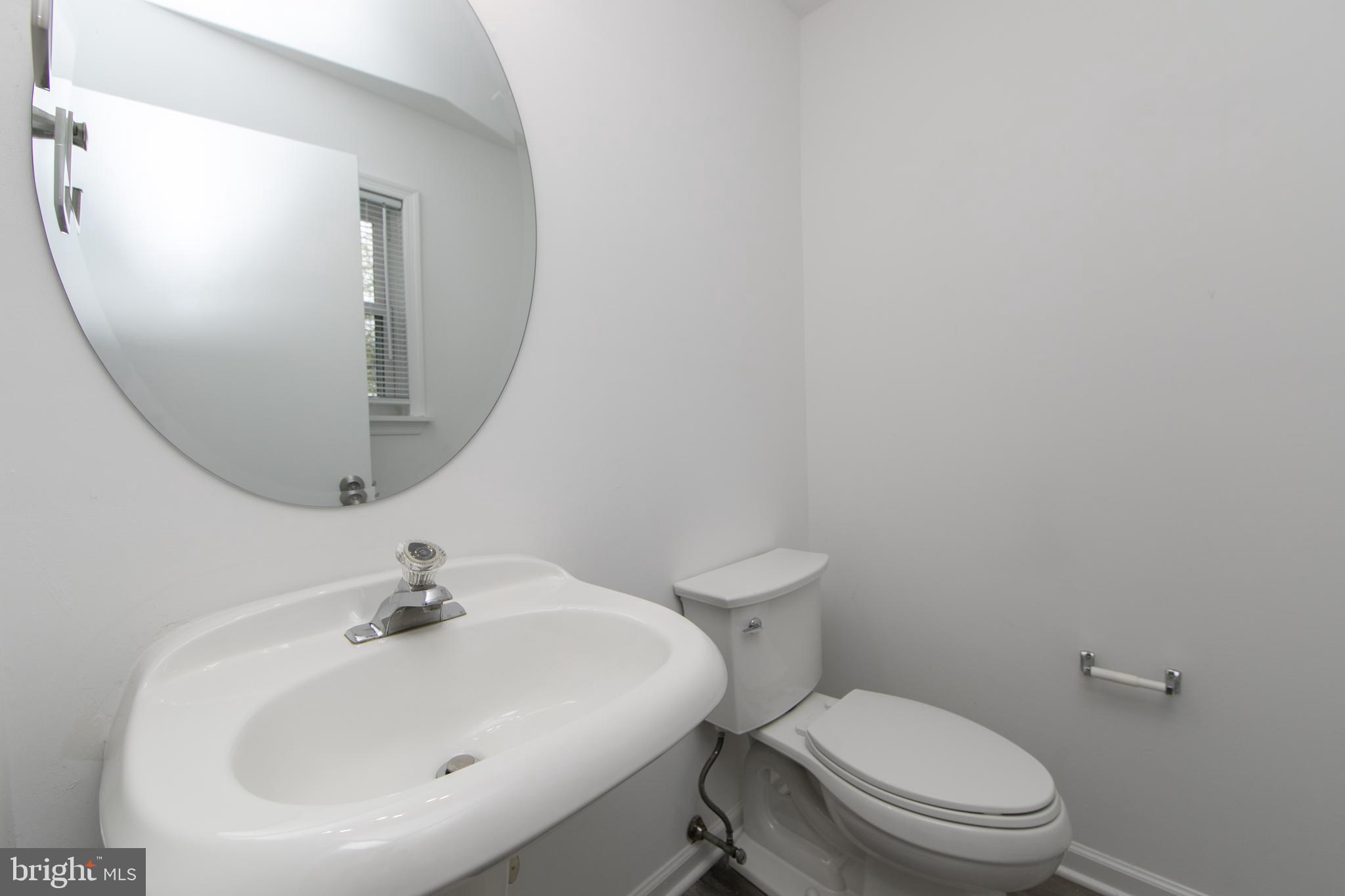5401 Red Haven Drive Evesham, NJ 08053 - Photo 21 of 35 a white toilet sitting next to a bathroom sink