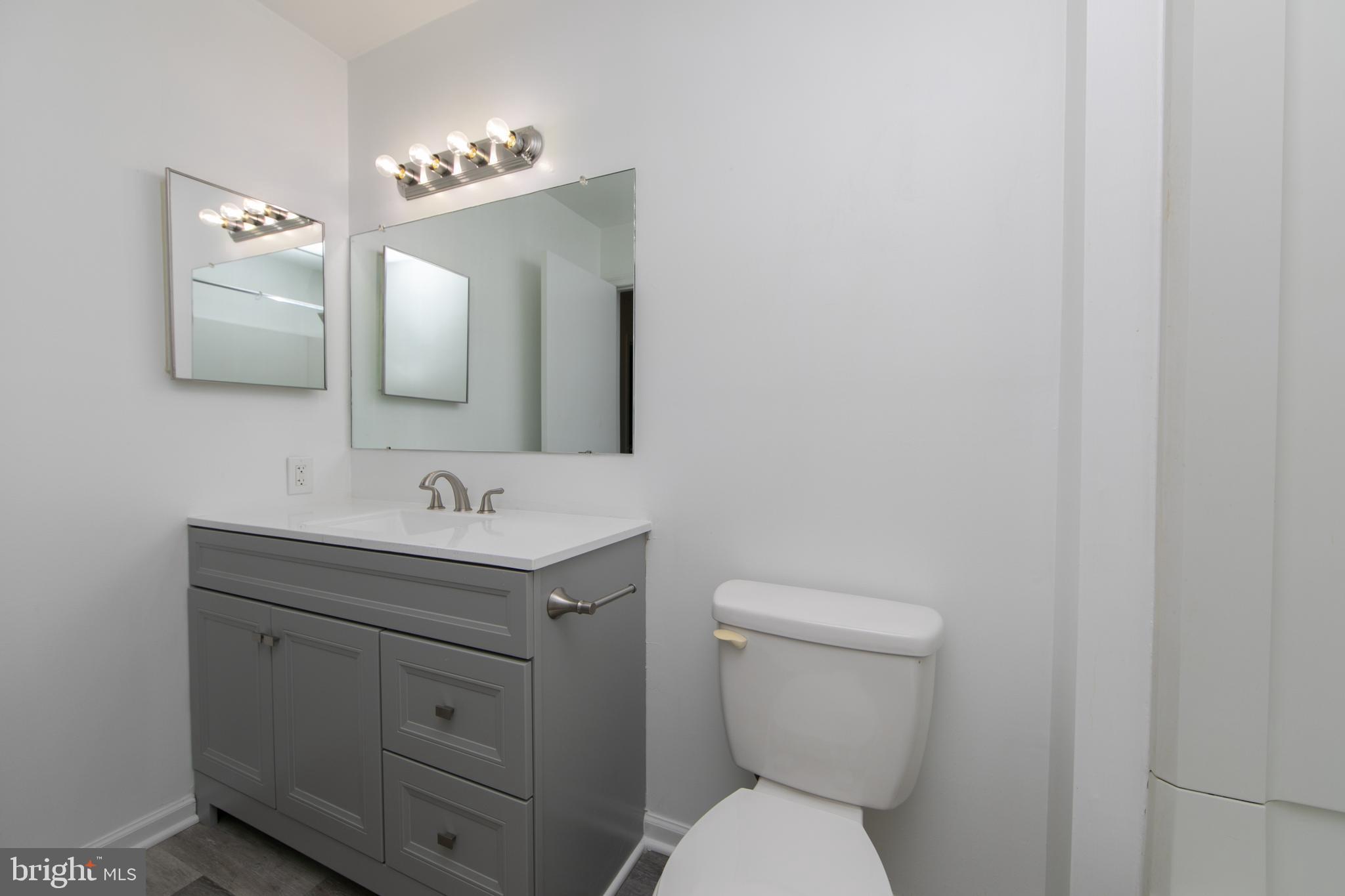 5401 Red Haven Drive Evesham, NJ 08053 - Photo 22 of 35 a bathroom with a toilet a sink and mirror