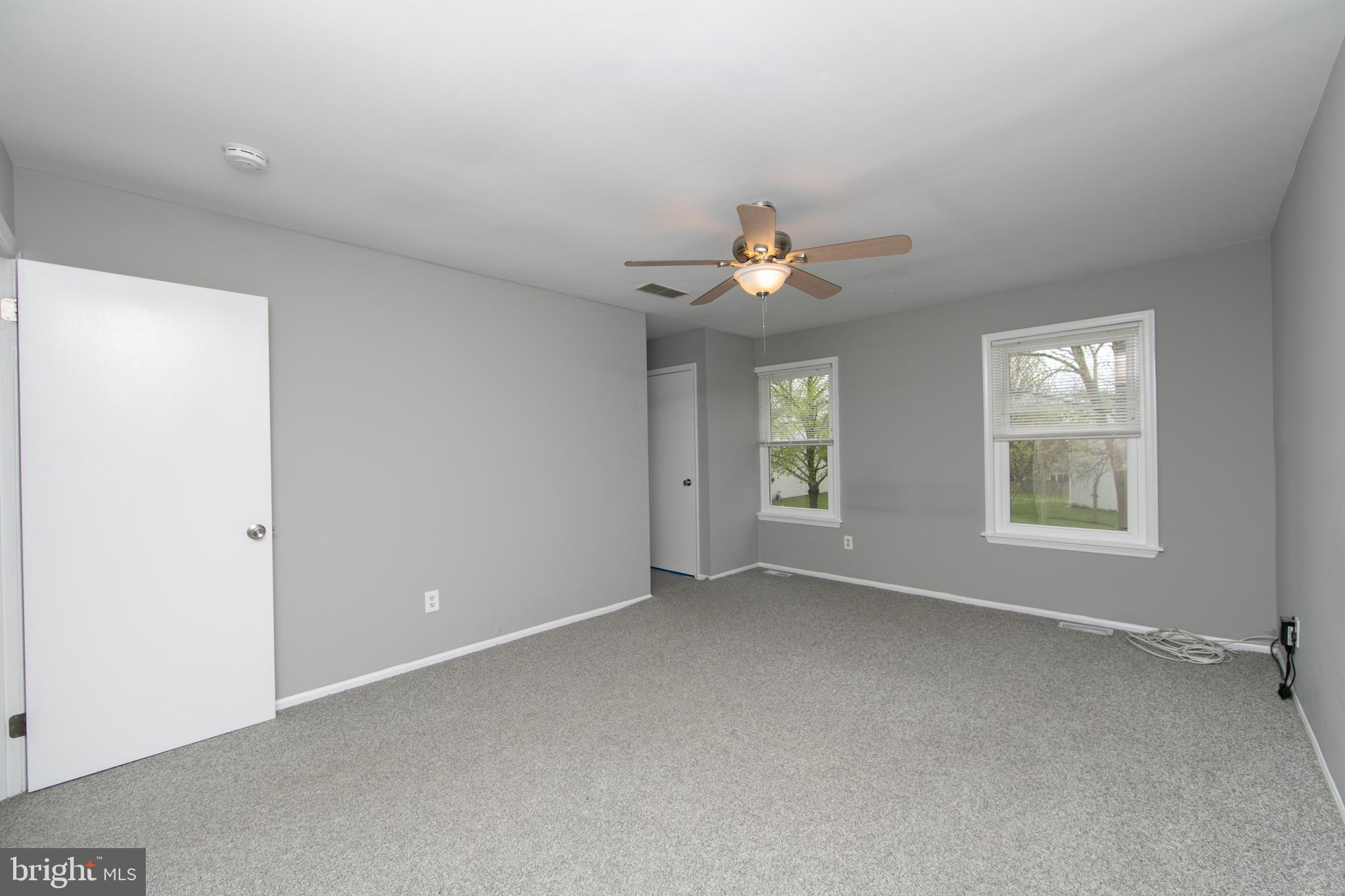 5401 Red Haven Drive Evesham, NJ 08053 - Photo 25 of 35 an empty room with windows and fan