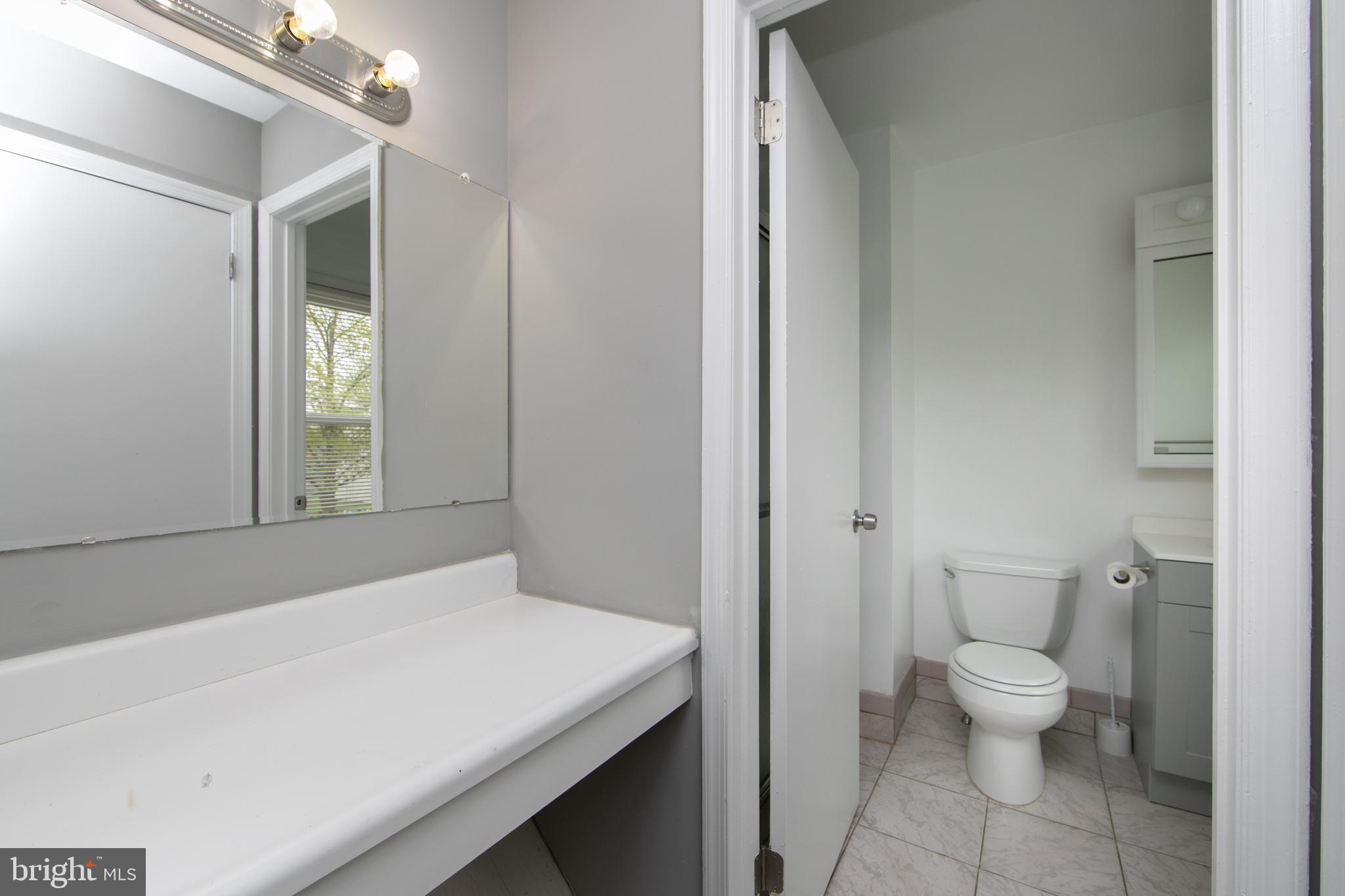 5401 Red Haven Drive Evesham, NJ 08053 - Photo 27 of 35 a bathroom with a toilet a sink and a mirror