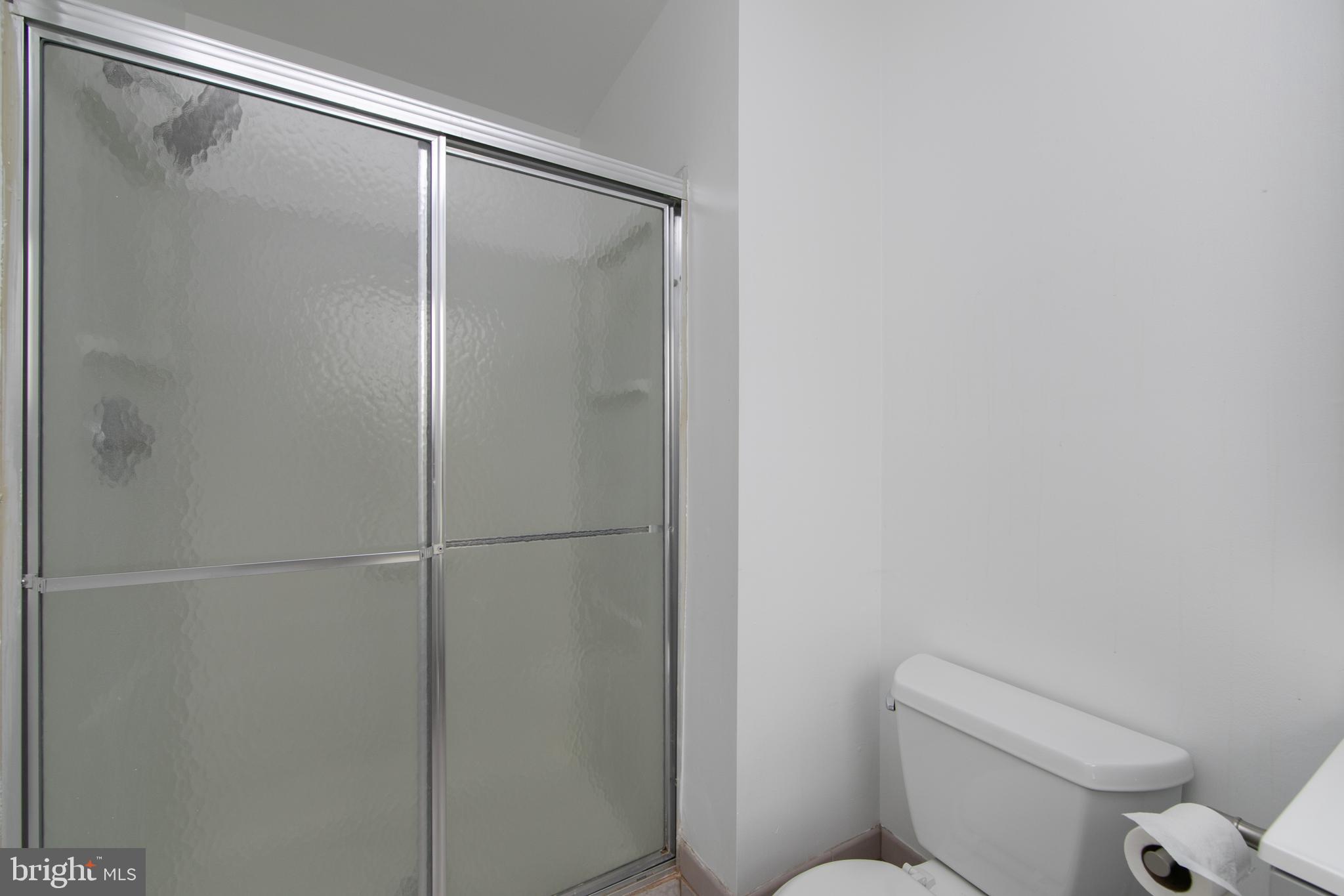 5401 Red Haven Drive Evesham, NJ 08053 - Photo 29 of 35 a white toilet sitting next to a shower