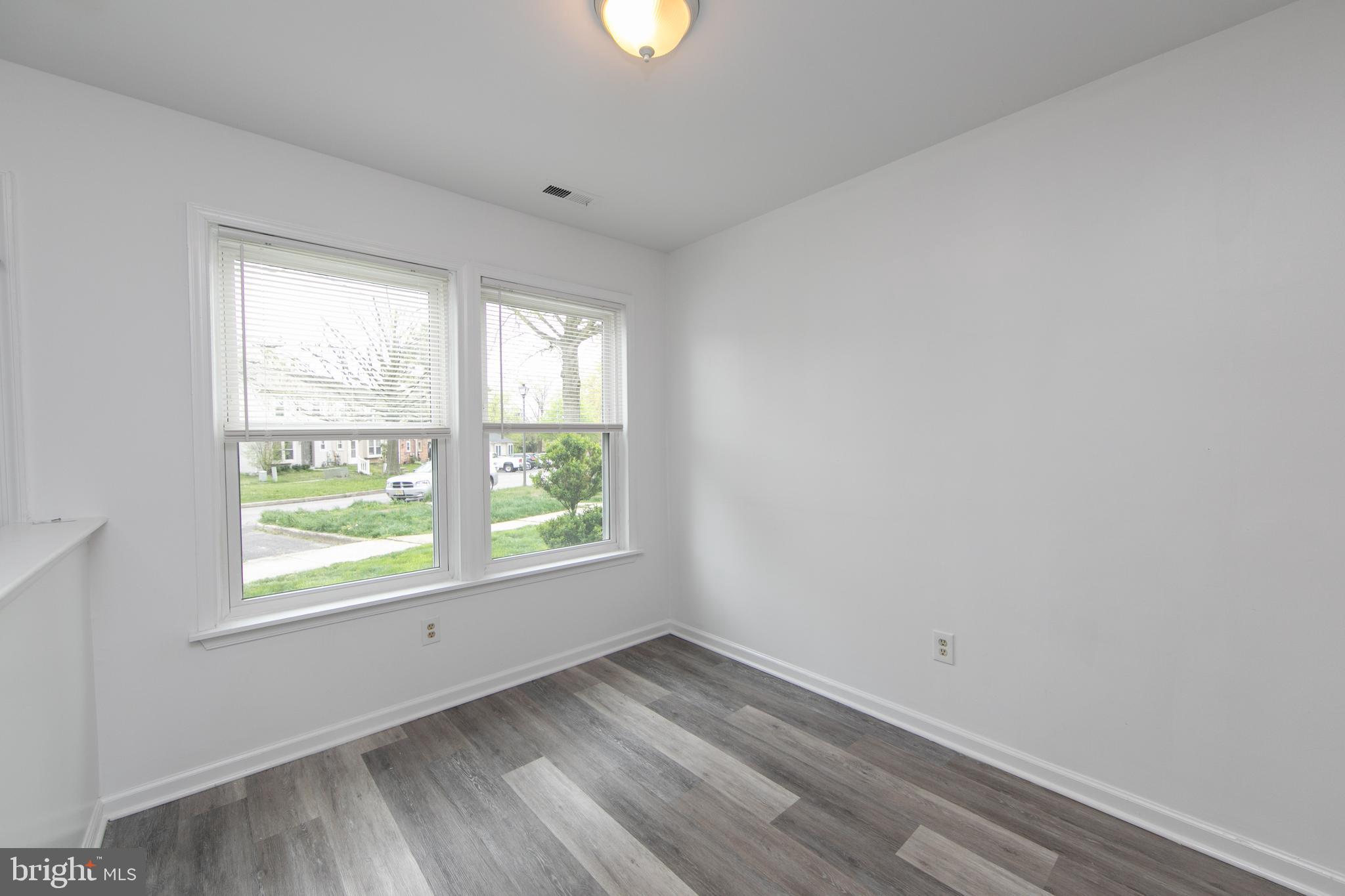 5401 Red Haven Drive Evesham, NJ 08053 - Photo 8 of 35 an empty room with wooden floor and windows