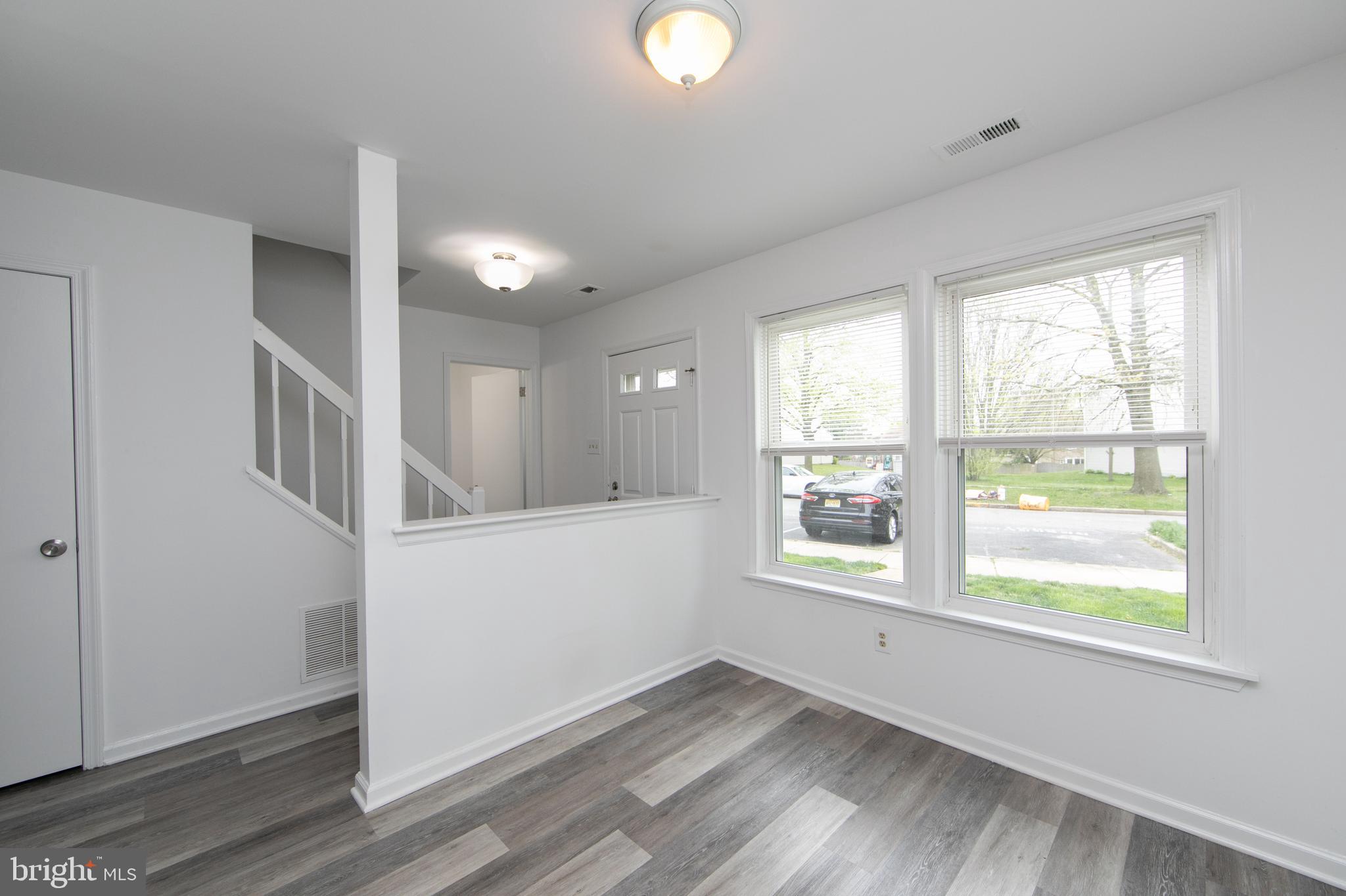 5401 Red Haven Drive Evesham, NJ 08053 - Photo 10 of 35 a view of an empty room with wooden floor and a window