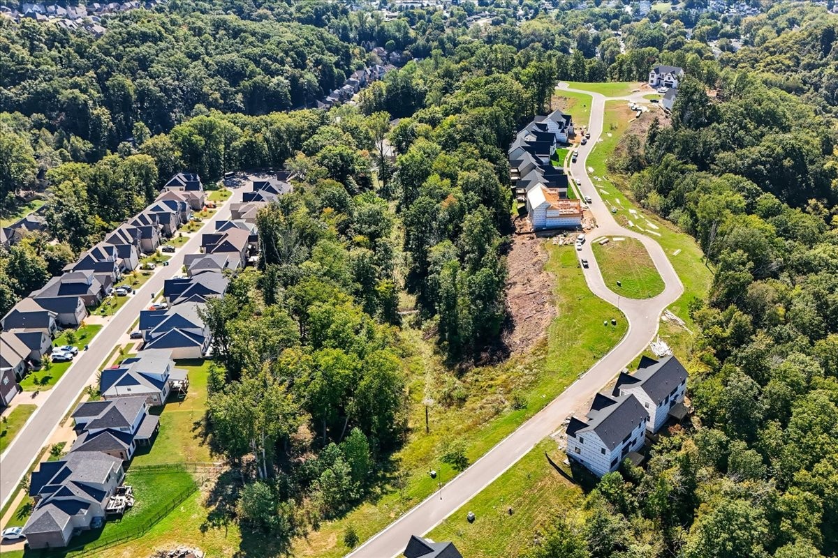 908 Spring Ridge Court Nashville, TN 37221 - Photo 6 of 7 an aerial view of a house with a yard and swimming pool