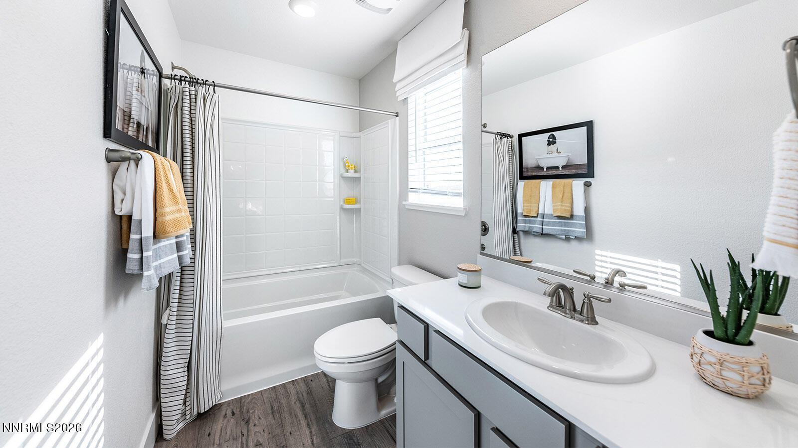 7587 Plump Jack Lane Reno, NV 89506 - Photo 12 of 13 a bathroom with a granite countertop sink toilet and shower