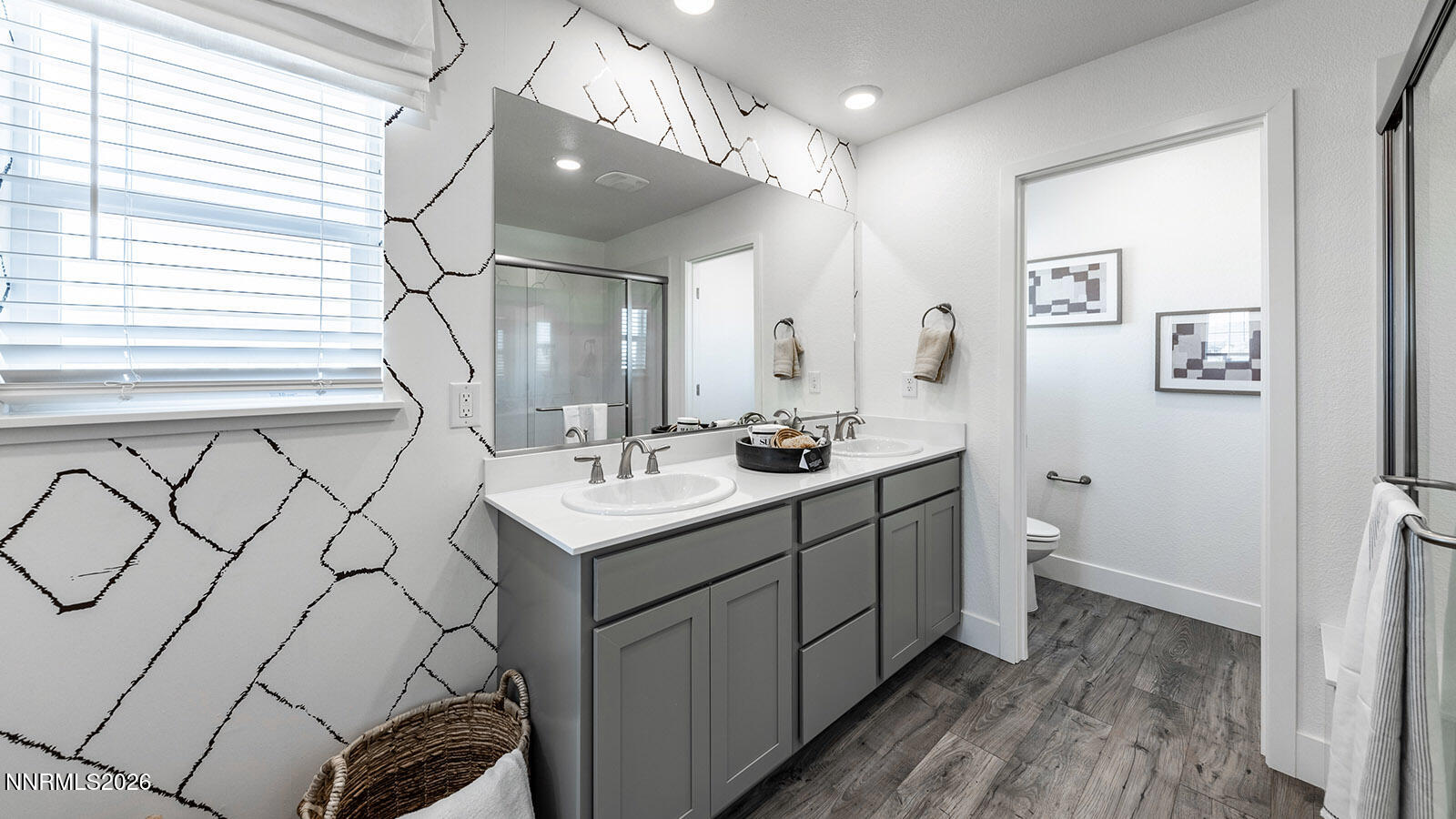 7587 Plump Jack Lane Reno, NV 89506 - Photo 9 of 13 a bathroom with a sink and a mirror
