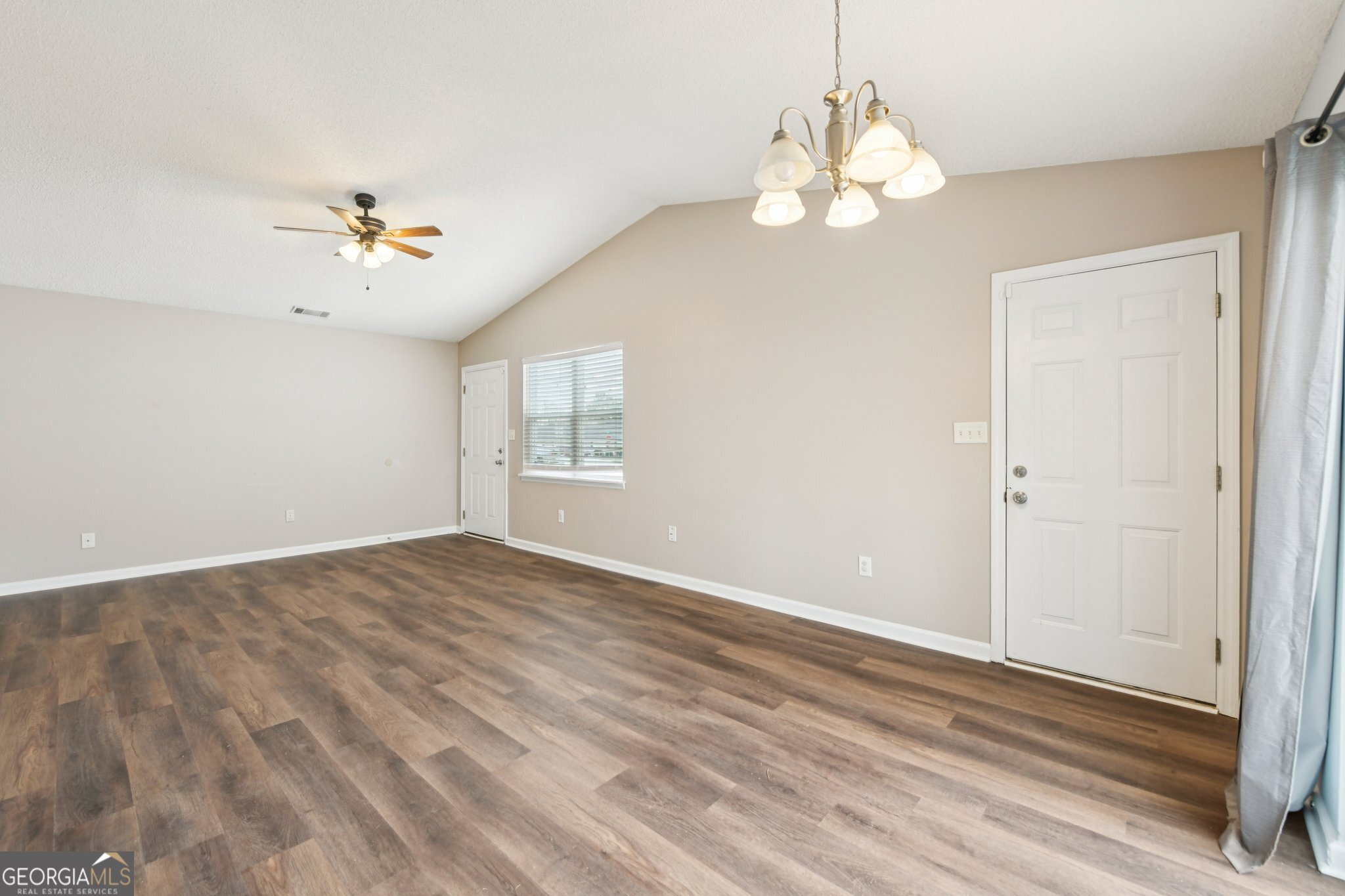 269 Buckingham Court Athens, GA 30607 - Photo 12 of 35 wooden floor in an empty room with a window