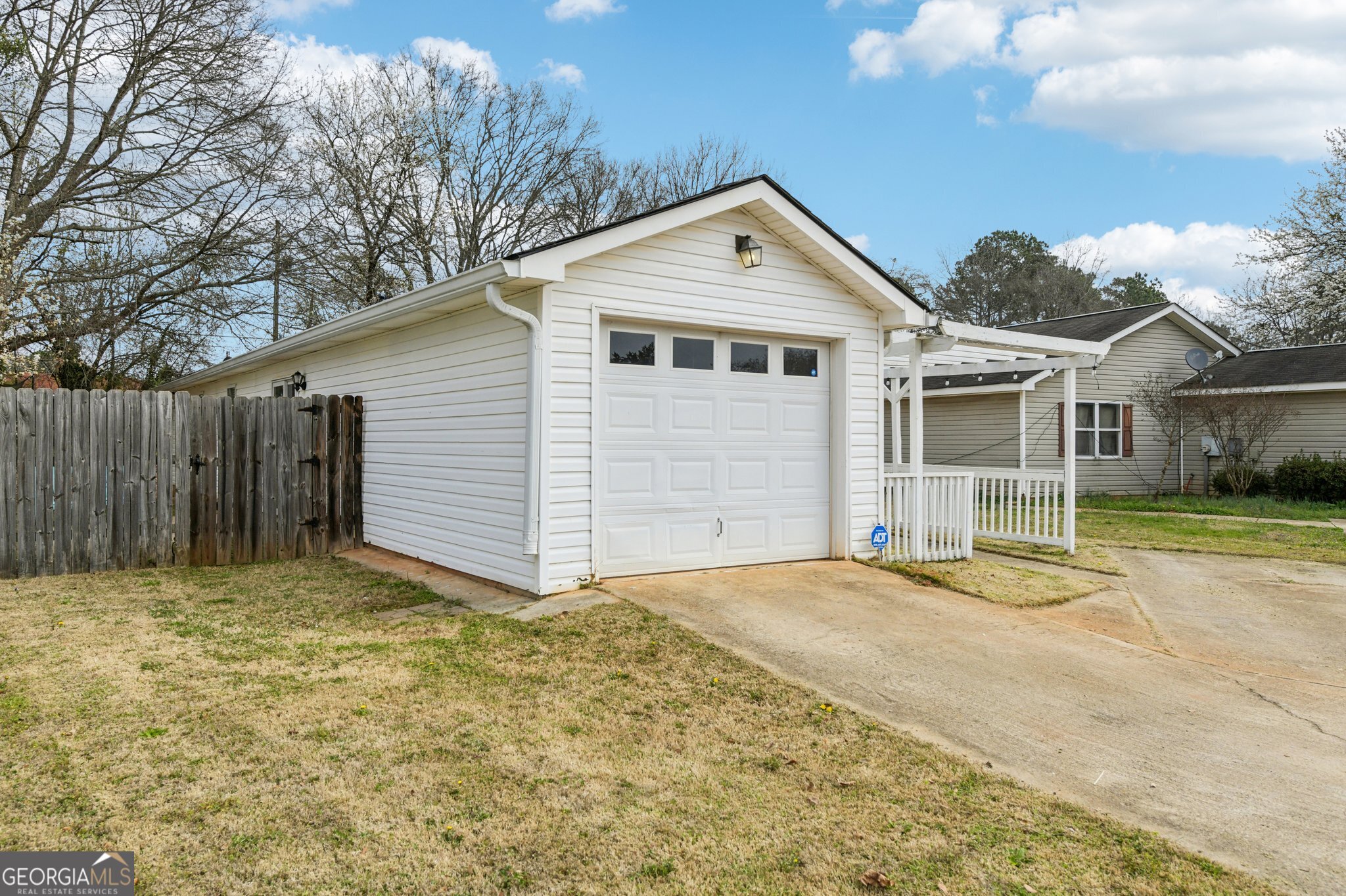 269 Buckingham Court Athens, GA 30607 - Photo 2 of 35 a front view of a house with a yard and garage
