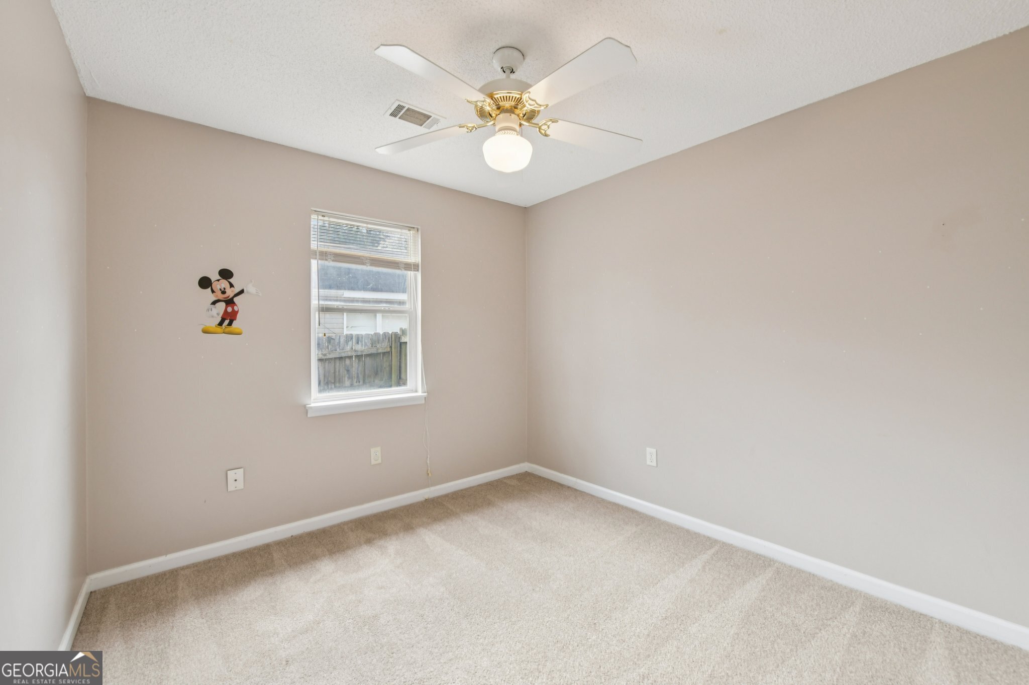 269 Buckingham Court Athens, GA 30607 - Photo 21 of 35 an empty room with windows and ceiling fan