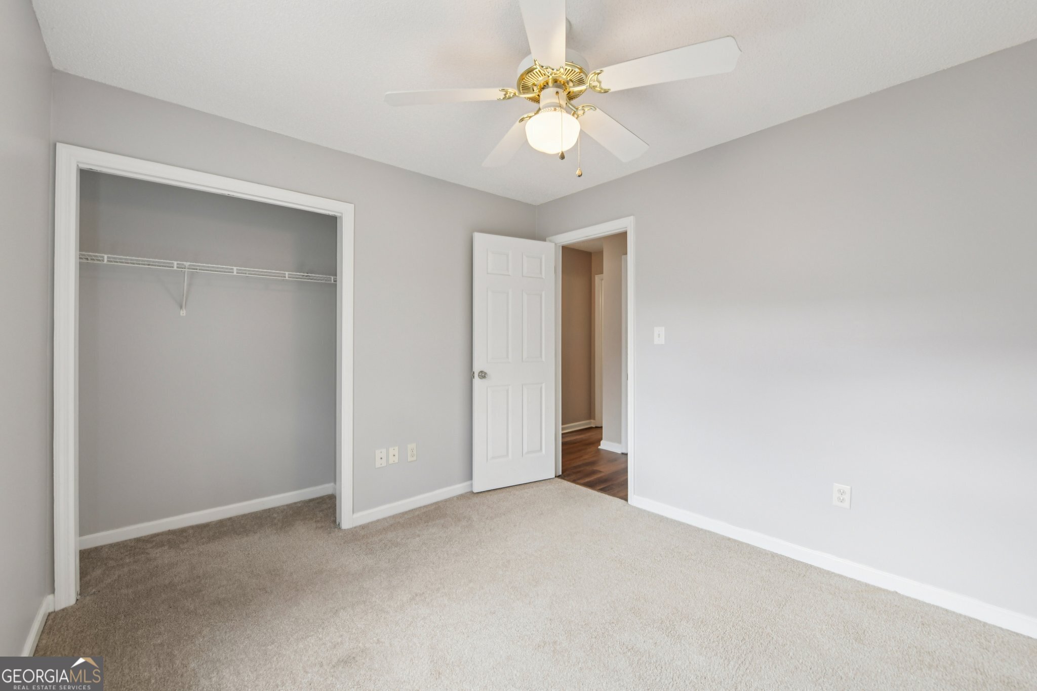 269 Buckingham Court Athens, GA 30607 - Photo 24 of 35 an empty room with a ceiling fan and a window
