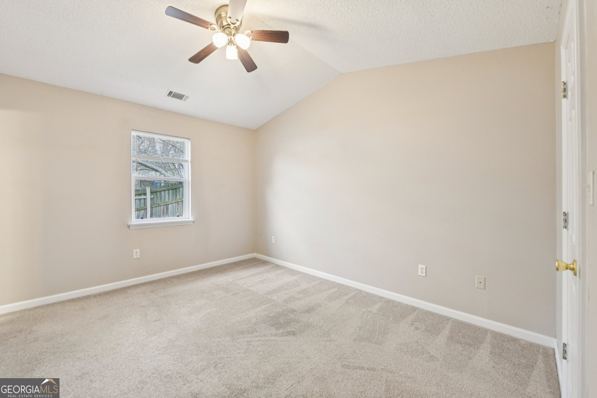 269 Buckingham Court Athens, GA 30607 - Photo 25 of 35 a view of an empty room with a window