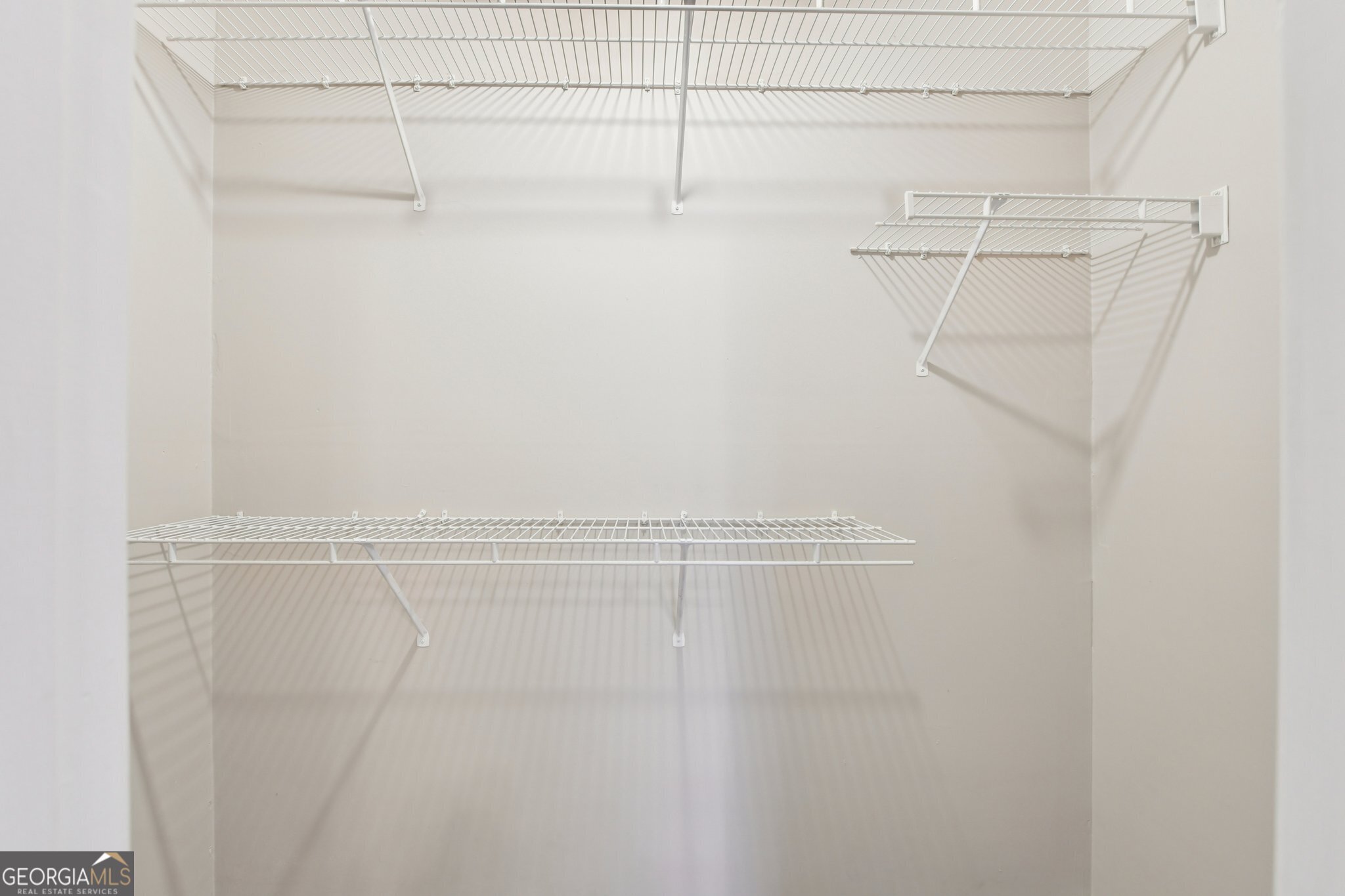 269 Buckingham Court Athens, GA 30607 - Photo 28 of 35 a view of a room with racks on the wall