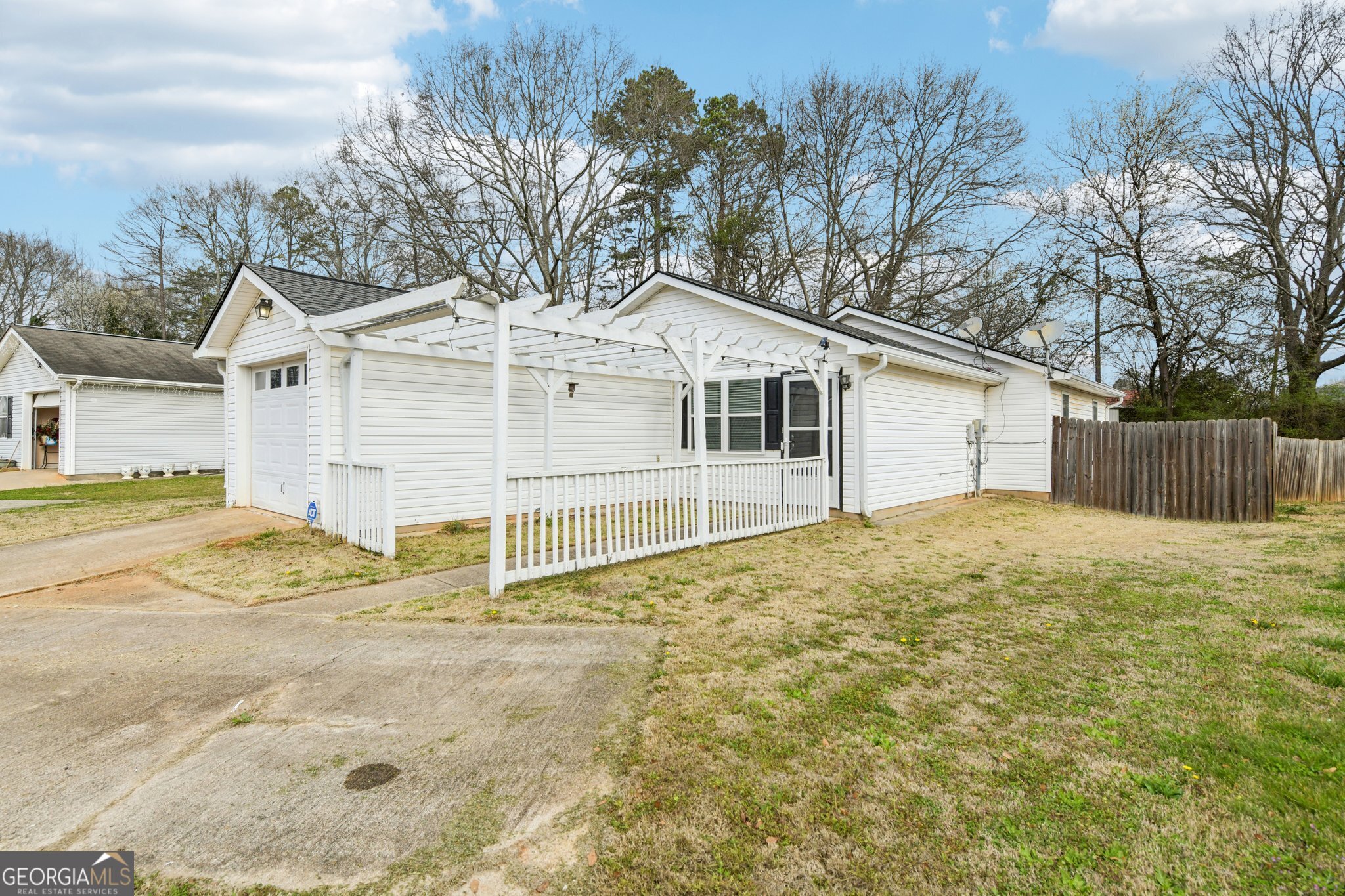 269 Buckingham Court Athens, GA 30607 - Photo 3 of 35 a white house that has a tree in front of it