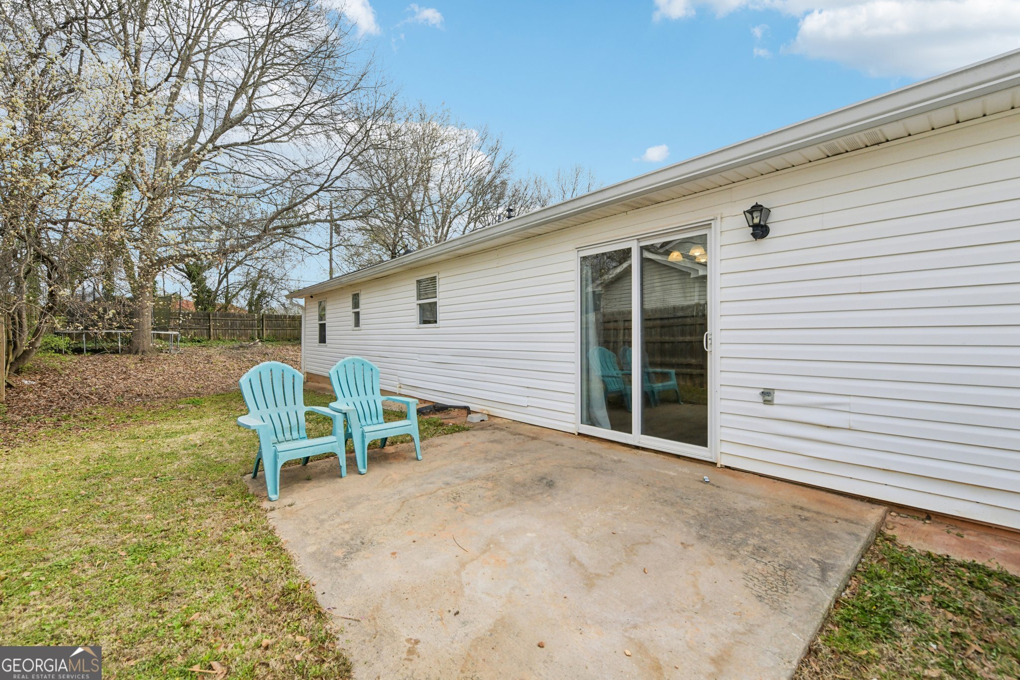 269 Buckingham Court Athens, GA 30607 - Photo 35 of 35 a view of a chairs and table in backyard of the house