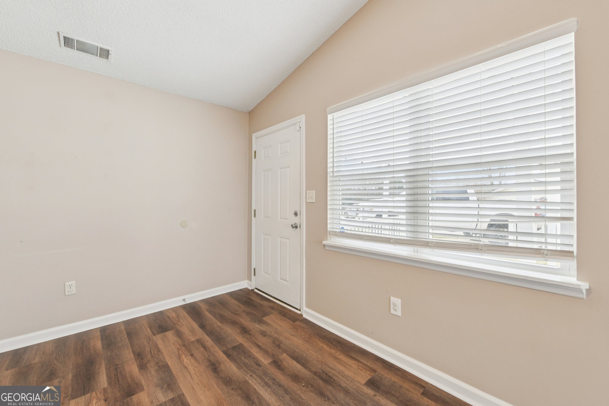 269 Buckingham Court Athens, GA 30607 - Photo 5 of 35 a view of a room that has a window in it