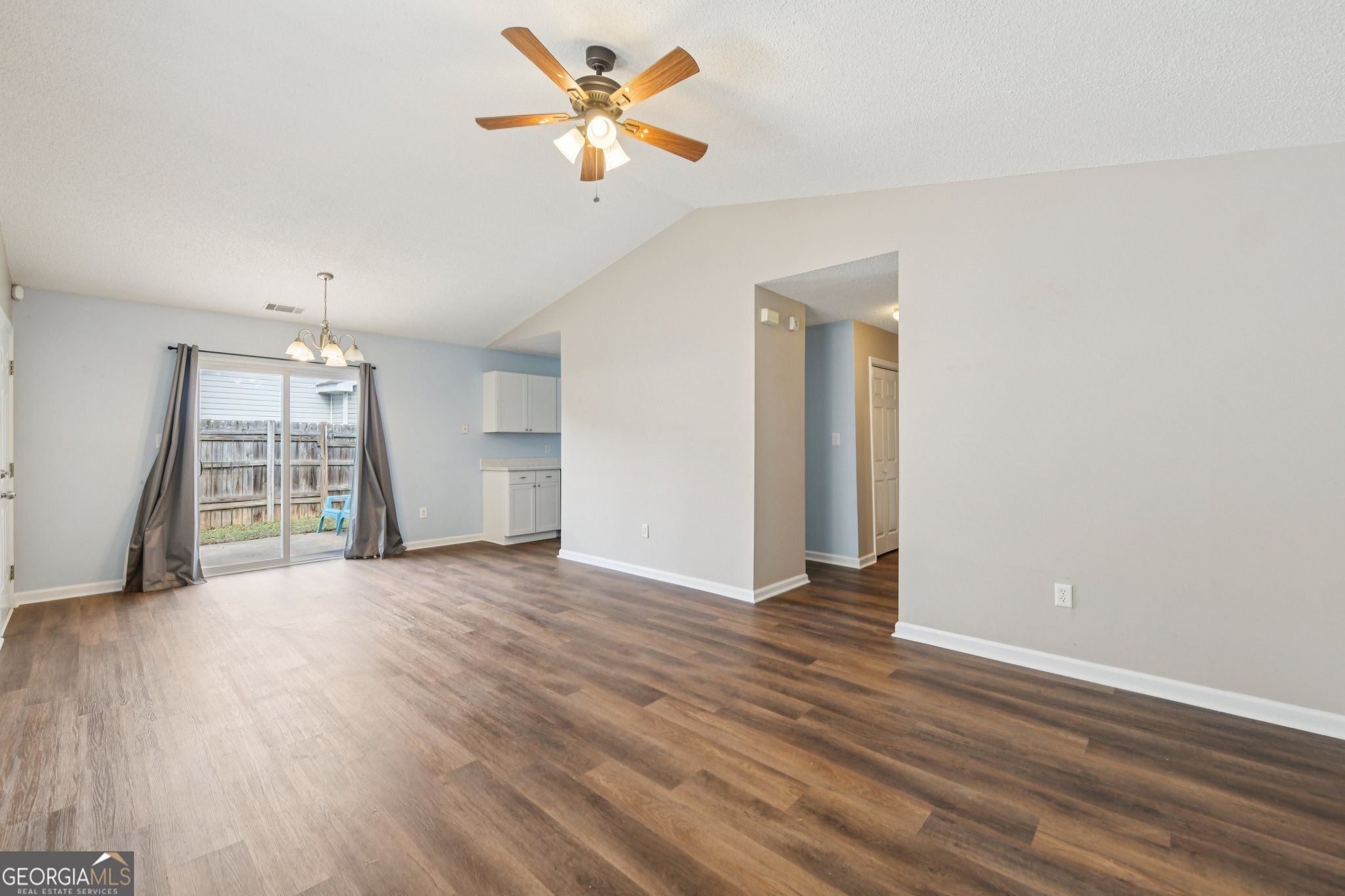 269 Buckingham Court Athens, GA 30607 - Photo 6 of 35 an empty room with wooden floor closet and windows