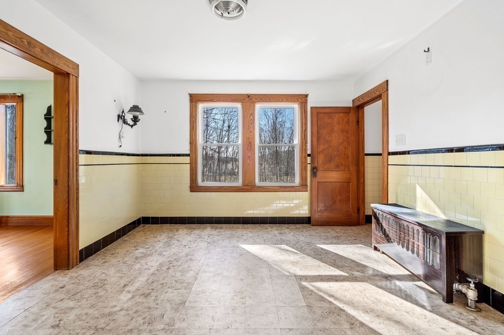 13 Dearborn Road Methuen, MA 01844 - Photo 15 of 39 a view of an empty room with a window