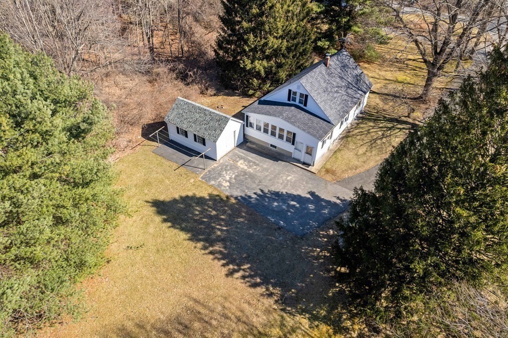 13 Dearborn Road Methuen, MA 01844 - Photo 2 of 39 a view of a wooden house with a yard