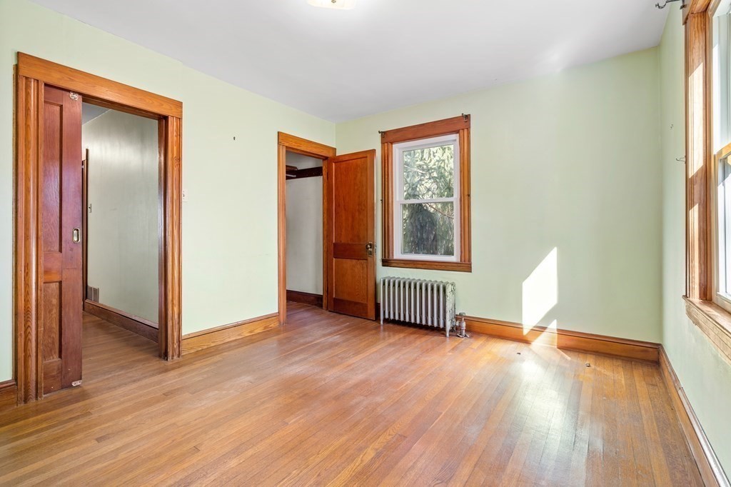 13 Dearborn Road Methuen, MA 01844 - Photo 23 of 39 a view of empty room with wooden floor and fan