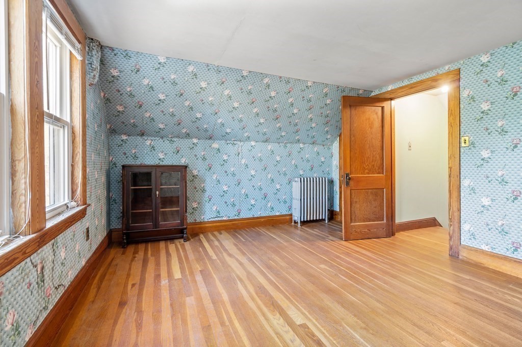 13 Dearborn Road Methuen, MA 01844 - Photo 26 of 39 a view of empty room with wooden floor and fan