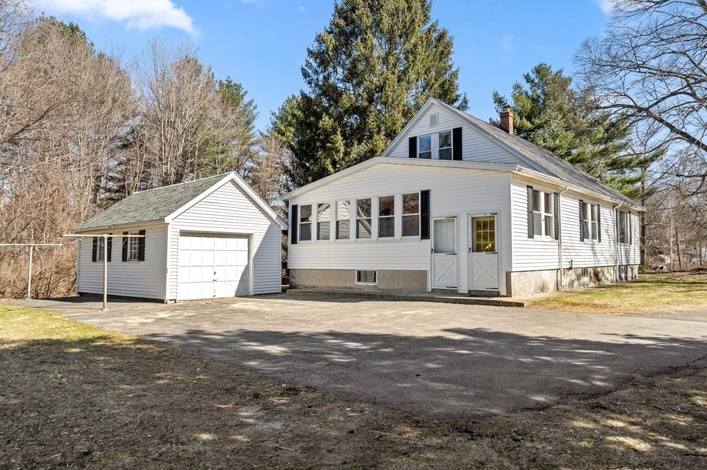 13 Dearborn Road Methuen, MA 01844 - Photo 32 of 39 a front view of a house with a yard