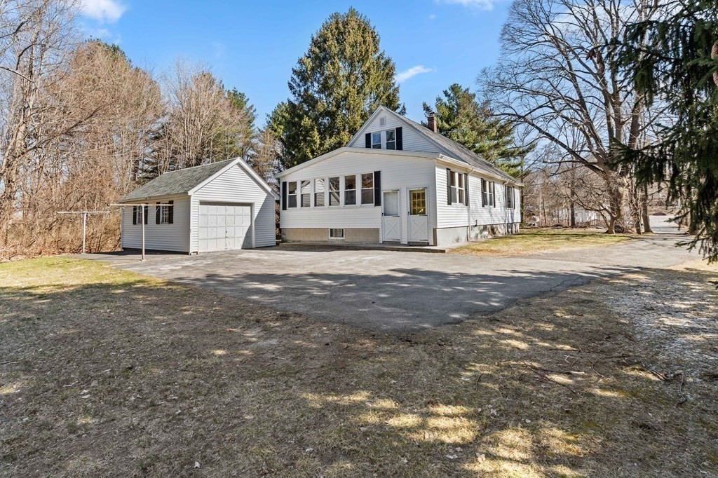 13 Dearborn Road Methuen, MA 01844 - Photo 8 of 39 a view of a house with a yard