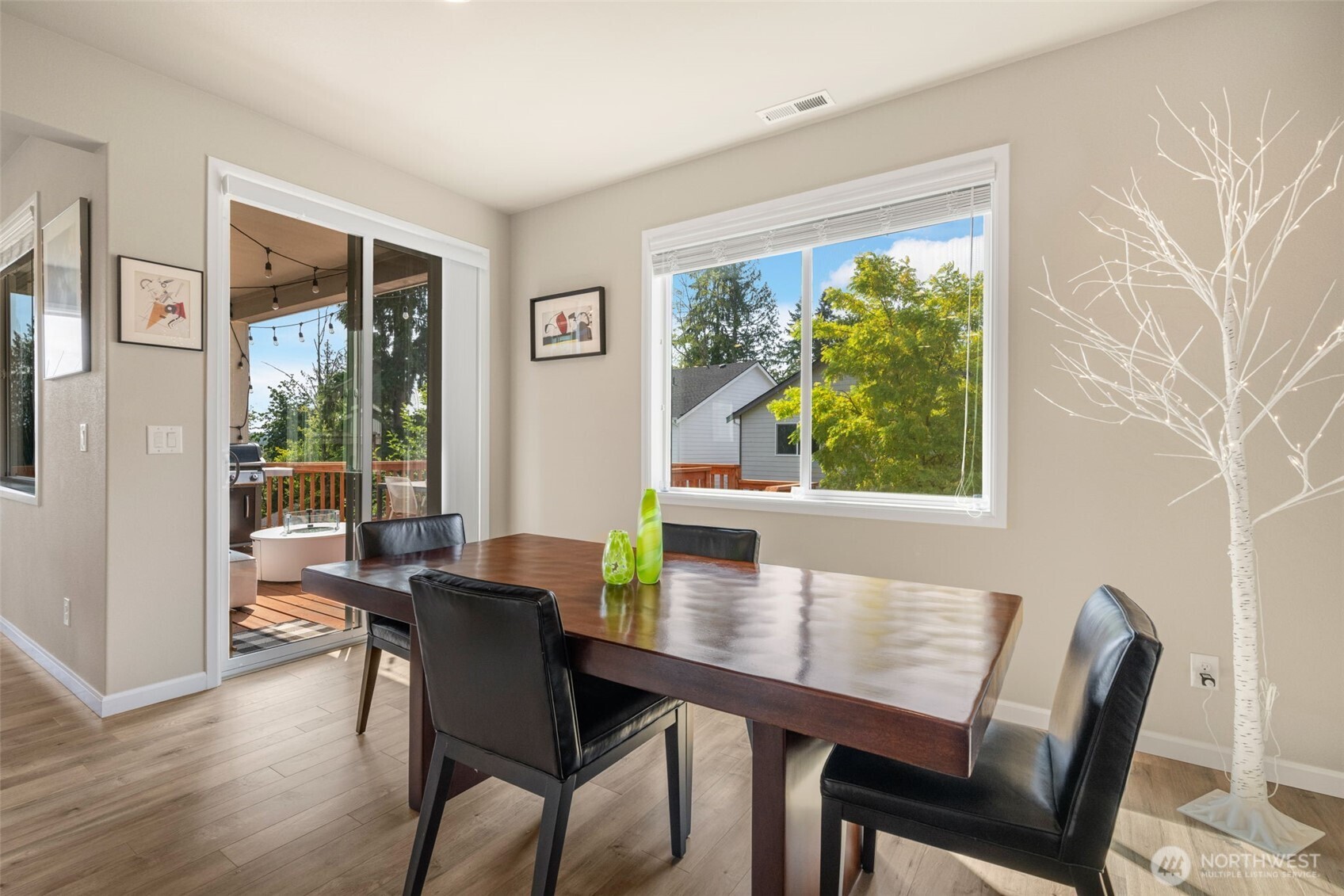216 178th Street Southeast Bothell, WA 98012 - Photo 14 of 40 a view of a dining room with furniture window and outside view