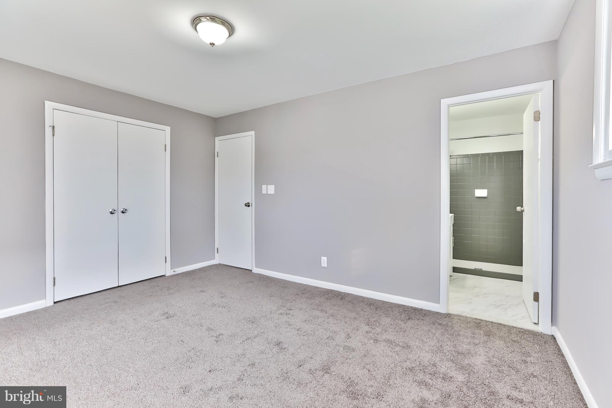 8807 Stephanie Road Randallstown, MD 21133 - Photo 16 of 42 Master Bedroom with Master Bathroom