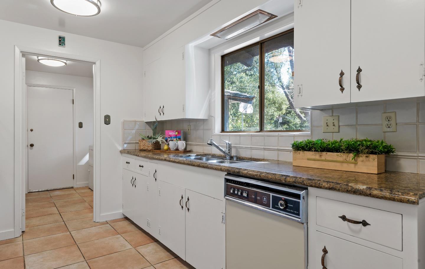 2 Lowery Drive Atherton, CA 94027 - Photo 11 of 32 a kitchen with granite countertop a sink and a stove