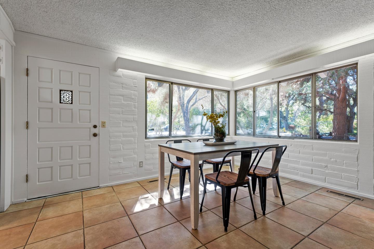 2 Lowery Drive Atherton, CA 94027 - Photo 15 of 32 a view of a dining room with furniture and window