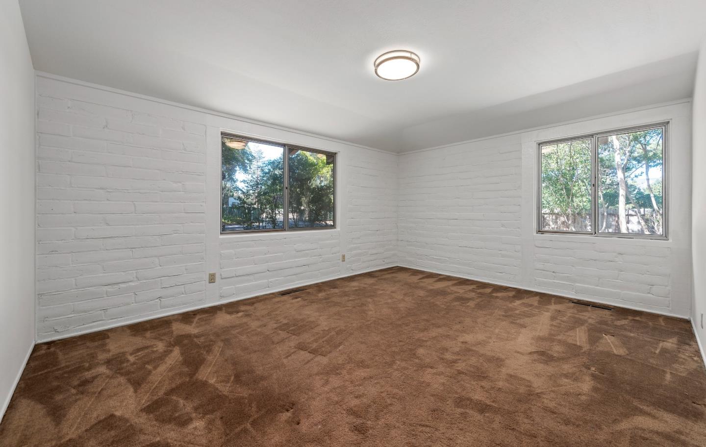 2 Lowery Drive Atherton, CA 94027 - Photo 17 of 32 an empty room with windows