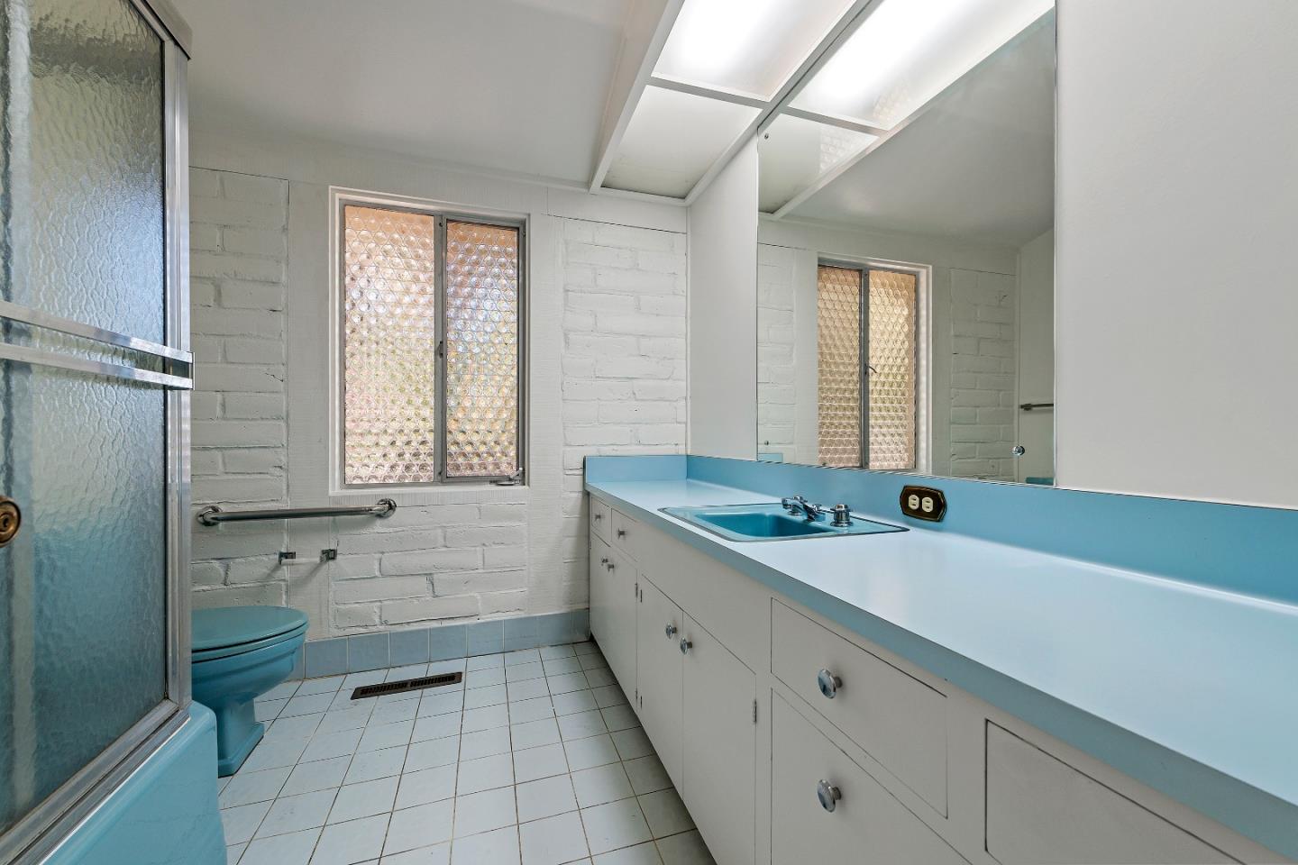 2 Lowery Drive Atherton, CA 94027 - Photo 19 of 32 a bathroom with a granite countertop sink mirror bathtub and toilet