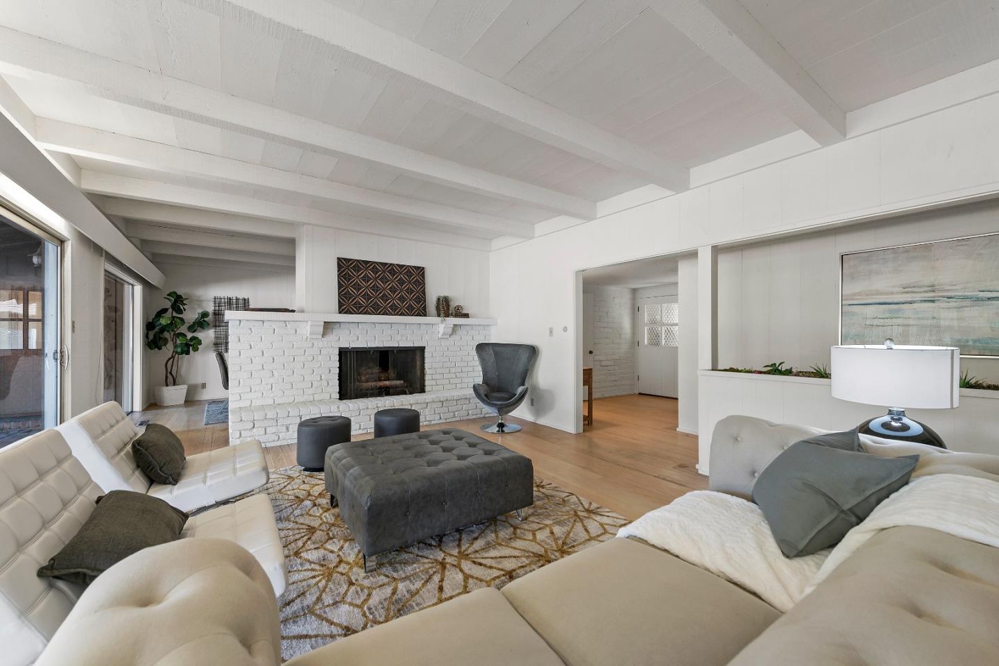 2 Lowery Drive Atherton, CA 94027 - Photo 4 of 32 a living room with furniture and a fireplace