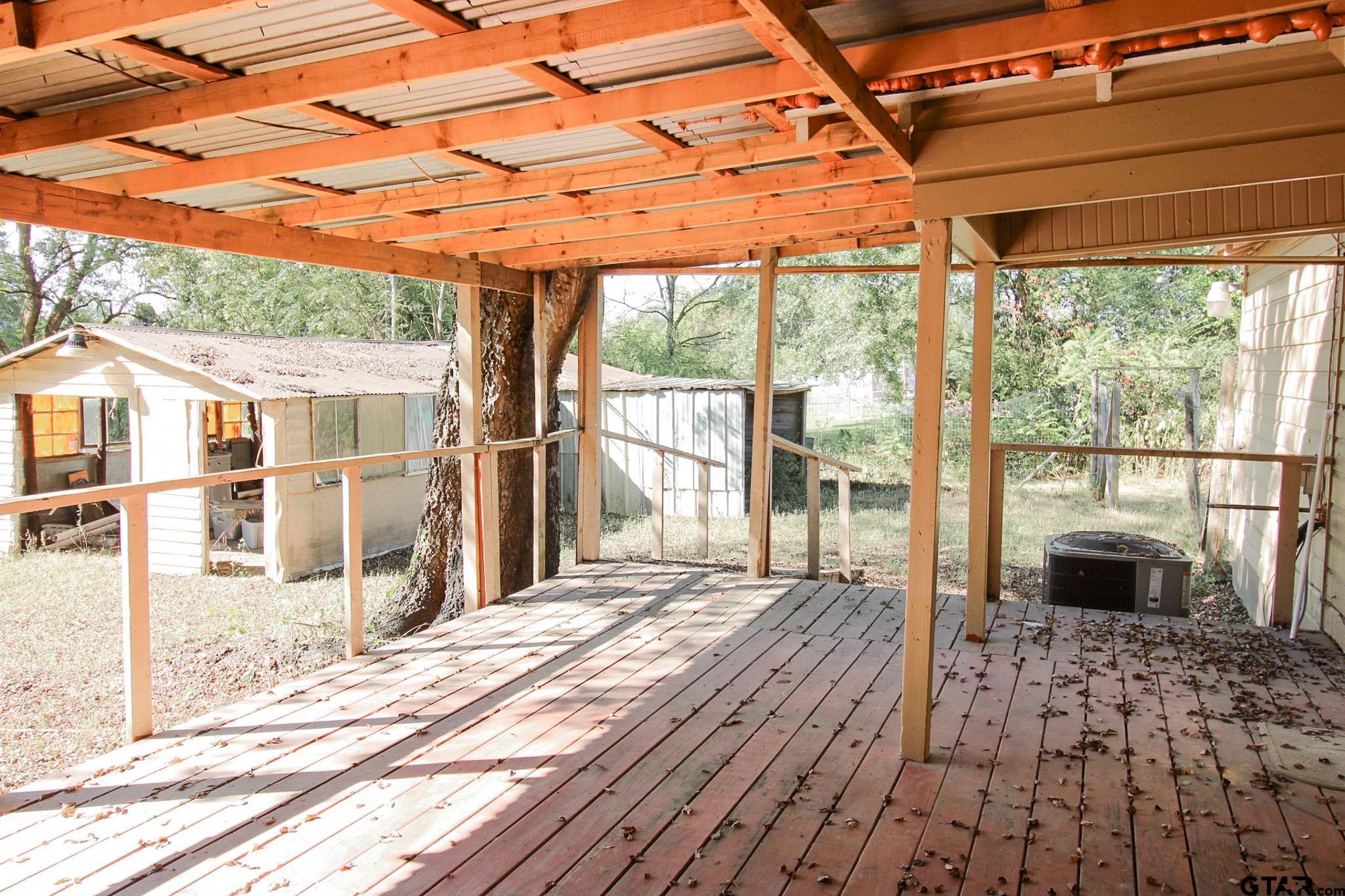 407 Pace Street Naples, TX 75568 - Photo 26 of 31 a outdoor space with seating