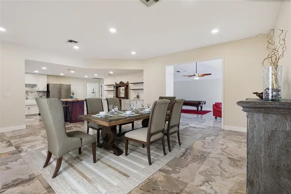 a view of a dining room with furniture