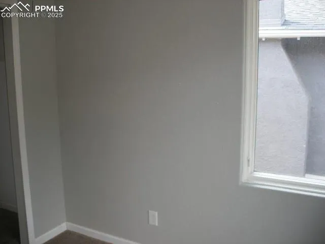 a bathroom with a toilet and a sink