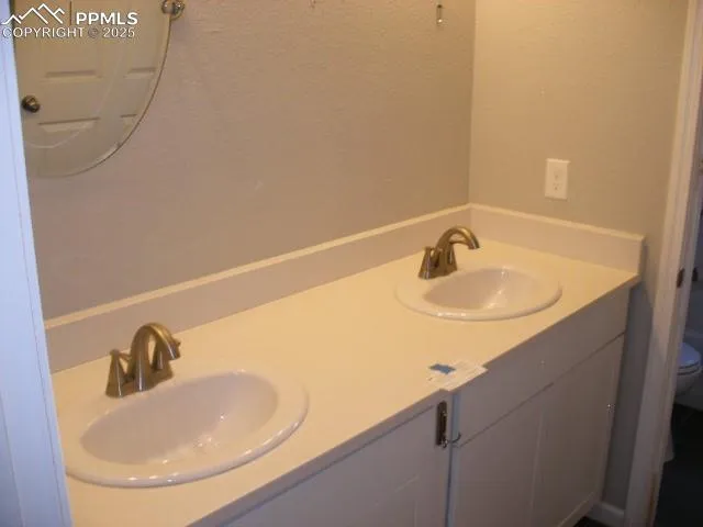 view of a bathroom with a sink and a toilet