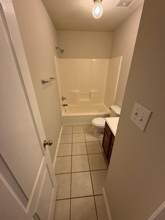 5540 Homestead Road Arlington, TX 76017 - Photo 9 of 11 a bathroom with a sink a toilet and shower