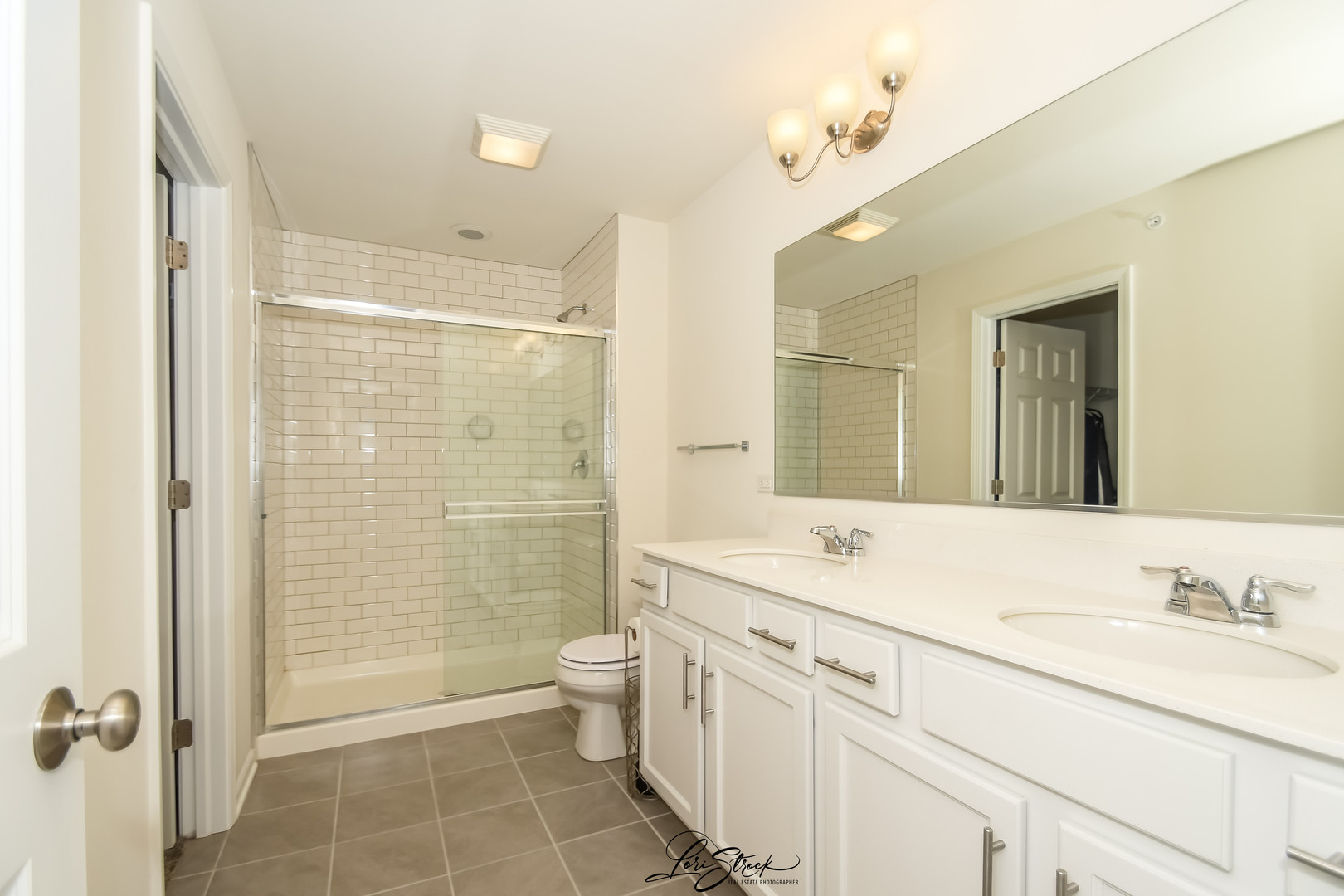 13926 South Addison Trail Homer Glen, IL 60491 - Photo 11 of 18 a bathroom with a granite countertop sink a toilet a mirror and shower